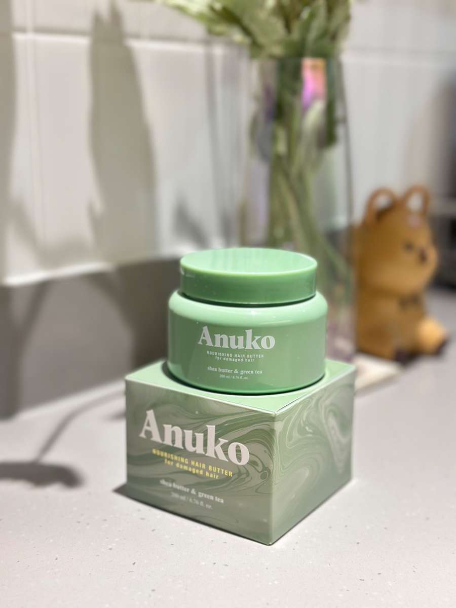 A verified Anuko customer showing their hair after using the Hair Butter
